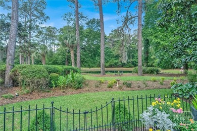 This exceptionally updated, one-level end unit on the lagoon is - photo 34