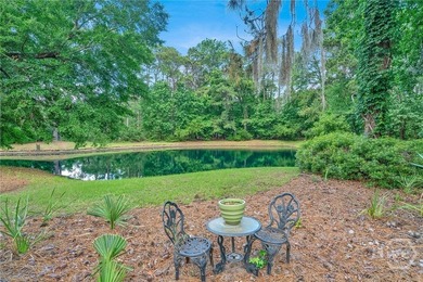 This exceptionally updated, one-level end unit on the lagoon is - photo 37