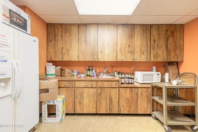 Situated just one block from Granada Blvd. and two blocks from - photo 13