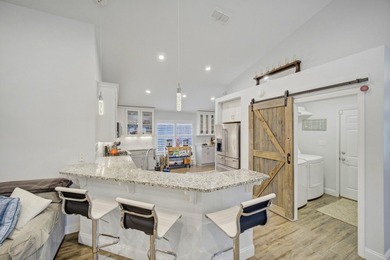 Welcome to this beautifully upgraded coastal retreat in the - photo 11