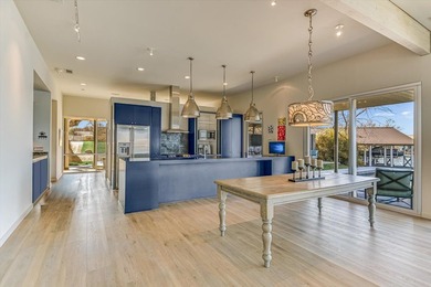 Welcome to 317 Scenic Dr., an exceptional waterfront property