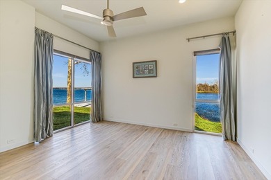 Welcome to 317 Scenic Dr., an exceptional waterfront property