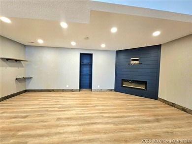 Beautifully positioned near the water's edge, this fully - photo 18