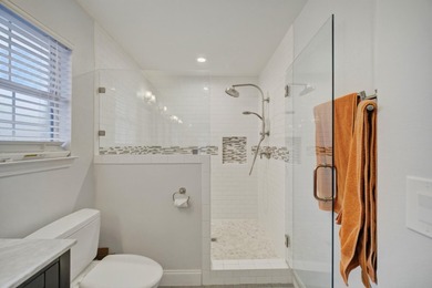 Welcome to this beautifully upgraded coastal retreat in the - photo 22