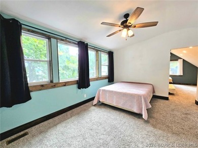 Beautifully positioned near the water's edge, this fully - photo 32