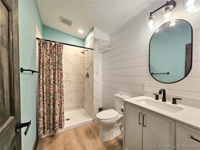 Beautifully positioned near the water's edge, this fully - photo 37