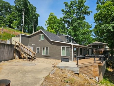 Beautifully positioned near the water's edge, this fully - photo 44