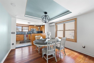 This well maintained multi-level home features hardwood floors - photo 5