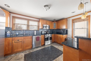 This well maintained multi-level home features hardwood floors - photo 6