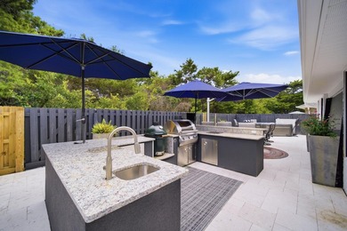 Welcome to this beautifully upgraded coastal retreat in the - photo 48