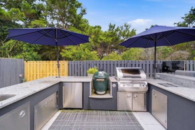 Welcome to this beautifully upgraded coastal retreat in the - photo 49