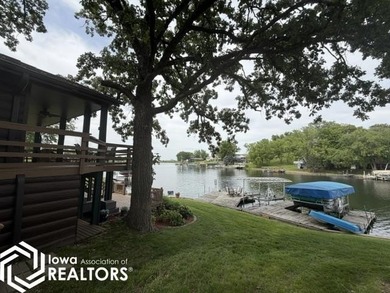 Tucked inside a quiet no-wake cove with stunning views of the - photo 11