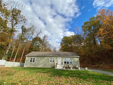 Nestled along the serene shores of Seneca Lake, this ranch - photo 2