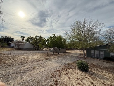 This 4.3 acre fenced property with Frio River frontage, a - photo 2