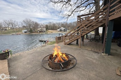 Tucked inside a quiet no-wake cove with stunning views of the - photo 12