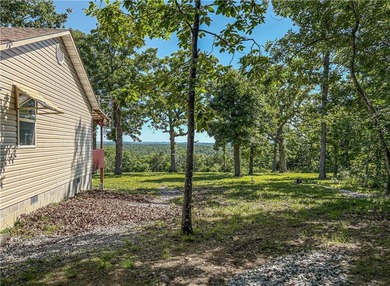 Tucked away in the beautiful Ozarks near Bull Shoals Lake, this - photo 13