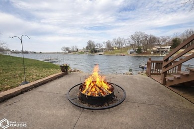 Tucked inside a quiet no-wake cove with stunning views of the - photo 13