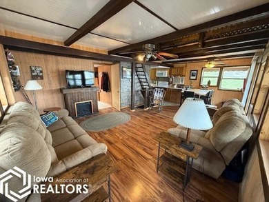 Tucked inside a quiet no-wake cove with stunning views of the - photo 14