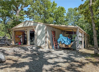 Tucked away in the beautiful Ozarks near Bull Shoals Lake, this - photo 15