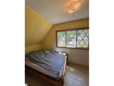 Nestled along the beautiful Rifle River, this charming - photo 15