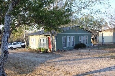 This 4.3 acre fenced property with Frio River frontage, a - photo 6