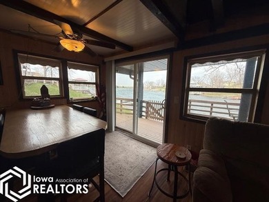 Tucked inside a quiet no-wake cove with stunning views of the - photo 16