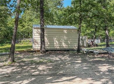 Tucked away in the beautiful Ozarks near Bull Shoals Lake, this - photo 18
