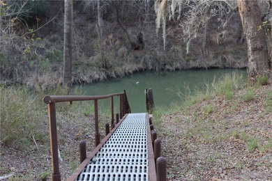 This 4.3 acre fenced property with Frio River frontage, a - photo 8