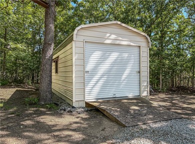 Tucked away in the beautiful Ozarks near Bull Shoals Lake, this - photo 19