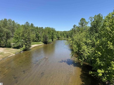 Nestled along the beautiful Rifle River, this charming - photo 20
