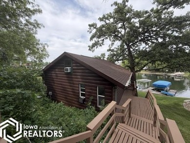 Tucked inside a quiet no-wake cove with stunning views of the - photo 31