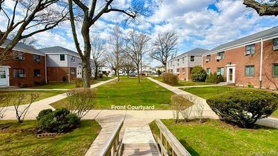 This corner-end unit features two bedrooms, Sunny & Bright with - photo 19