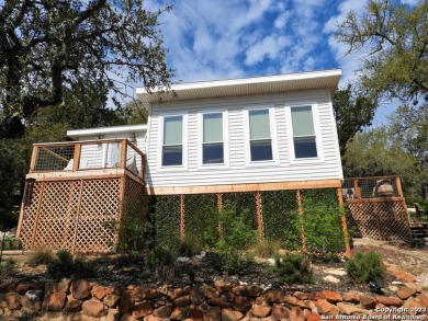 Experience the allure of this beautifully remodeled country - Lake Home For Sale in Lakehills, Texas
