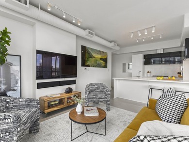 Perched on the coveted NW comer of the sub-penthouse level, this - photo 13