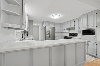 Charming 3 bedroom 2 bath home nestled on the banks of beautiful - photo 16