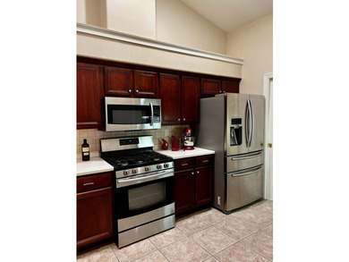 This beautiful, spacious home is located in the highly - photo 17