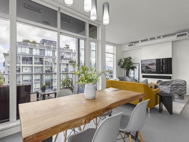 Perched on the coveted NW comer of the sub-penthouse level, this - photo 17