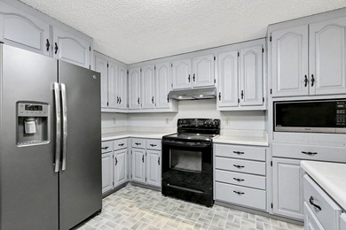 Charming 3 bedroom 2 bath home nestled on the banks of beautiful - photo 17