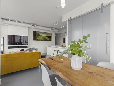 Perched on the coveted NW comer of the sub-penthouse level, this - photo 18