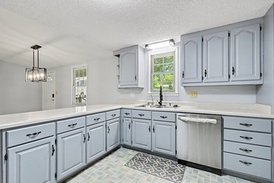 Charming 3 bedroom 2 bath home nestled on the banks of beautiful - photo 19
