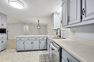 Charming 3 bedroom 2 bath home nestled on the banks of beautiful - photo 20