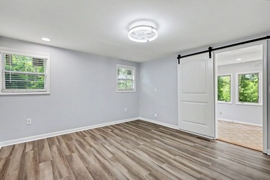 Charming 3 bedroom 2 bath home nestled on the banks of beautiful - photo 23