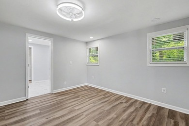 Charming 3 bedroom 2 bath home nestled on the banks of beautiful - photo 25