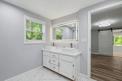 Charming 3 bedroom 2 bath home nestled on the banks of beautiful - photo 26