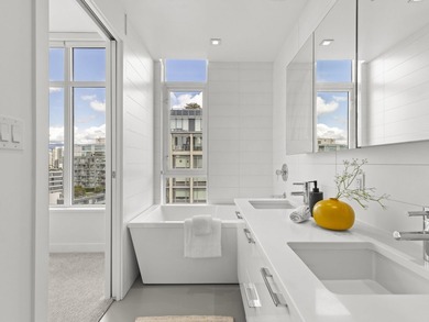 Perched on the coveted NW comer of the sub-penthouse level, this - photo 29