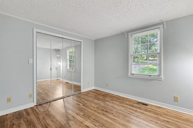 Charming 3 bedroom 2 bath home nestled on the banks of beautiful - photo 32