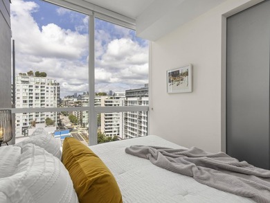 Perched on the coveted NW comer of the sub-penthouse level, this - photo 34