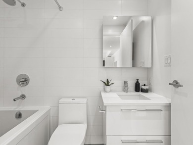 Perched on the coveted NW comer of the sub-penthouse level, this - photo 36