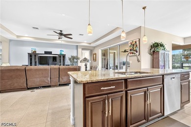 Welcome to 12840 Olde Banyon Boulevard in the sought-after gated - photo 12