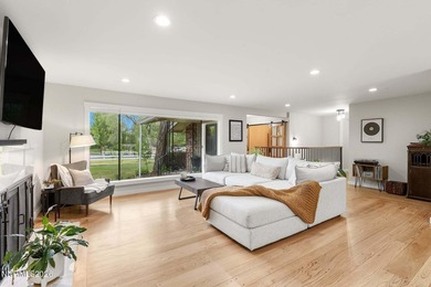 Tucked beneath a canopy of mature trees on a beautifully - photo 14